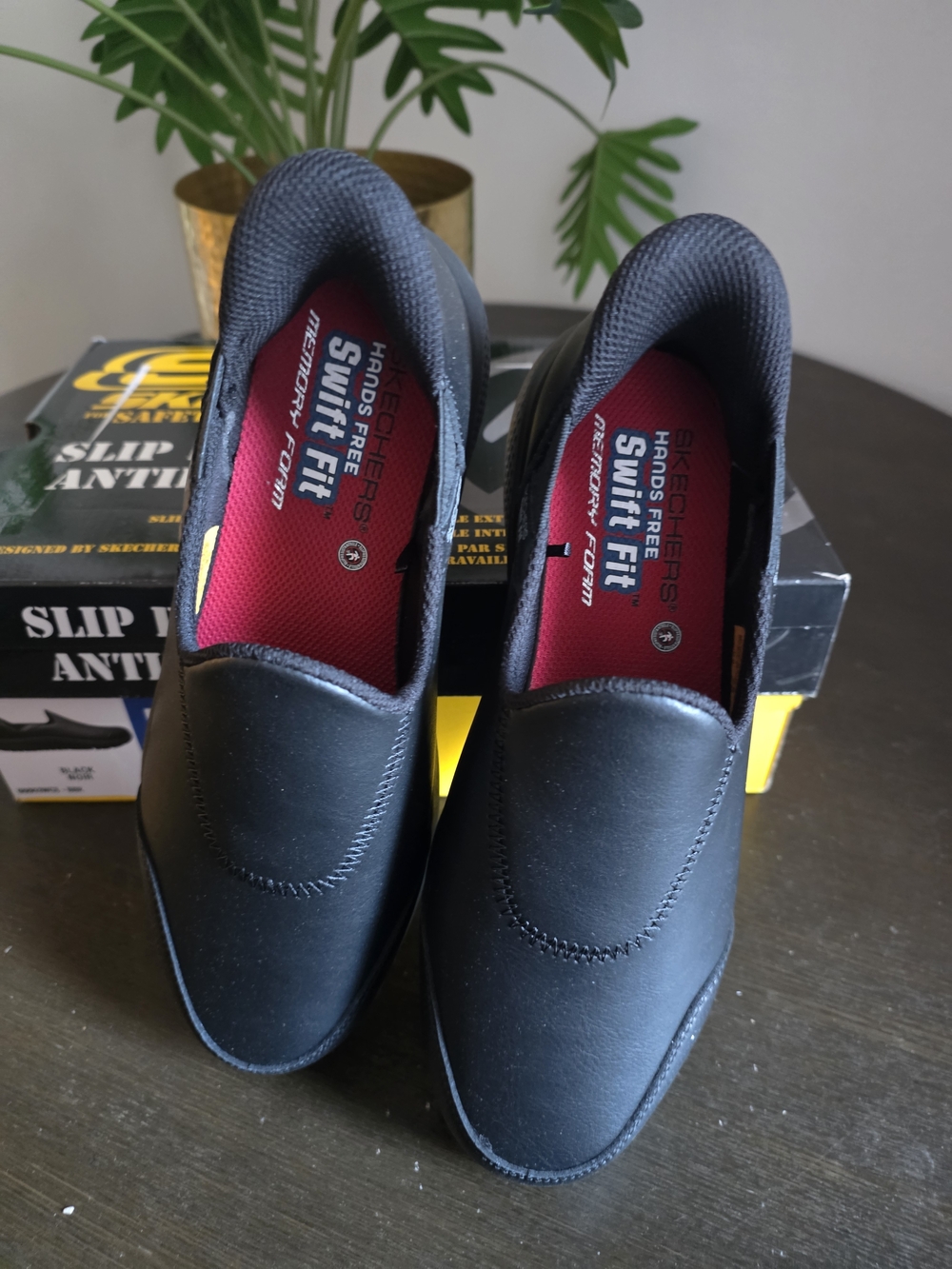 Skechers Women’s Black Slip-On Flats with Red Insole